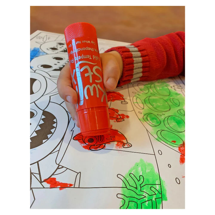 jumbo kwik stix in the hands of a toddler