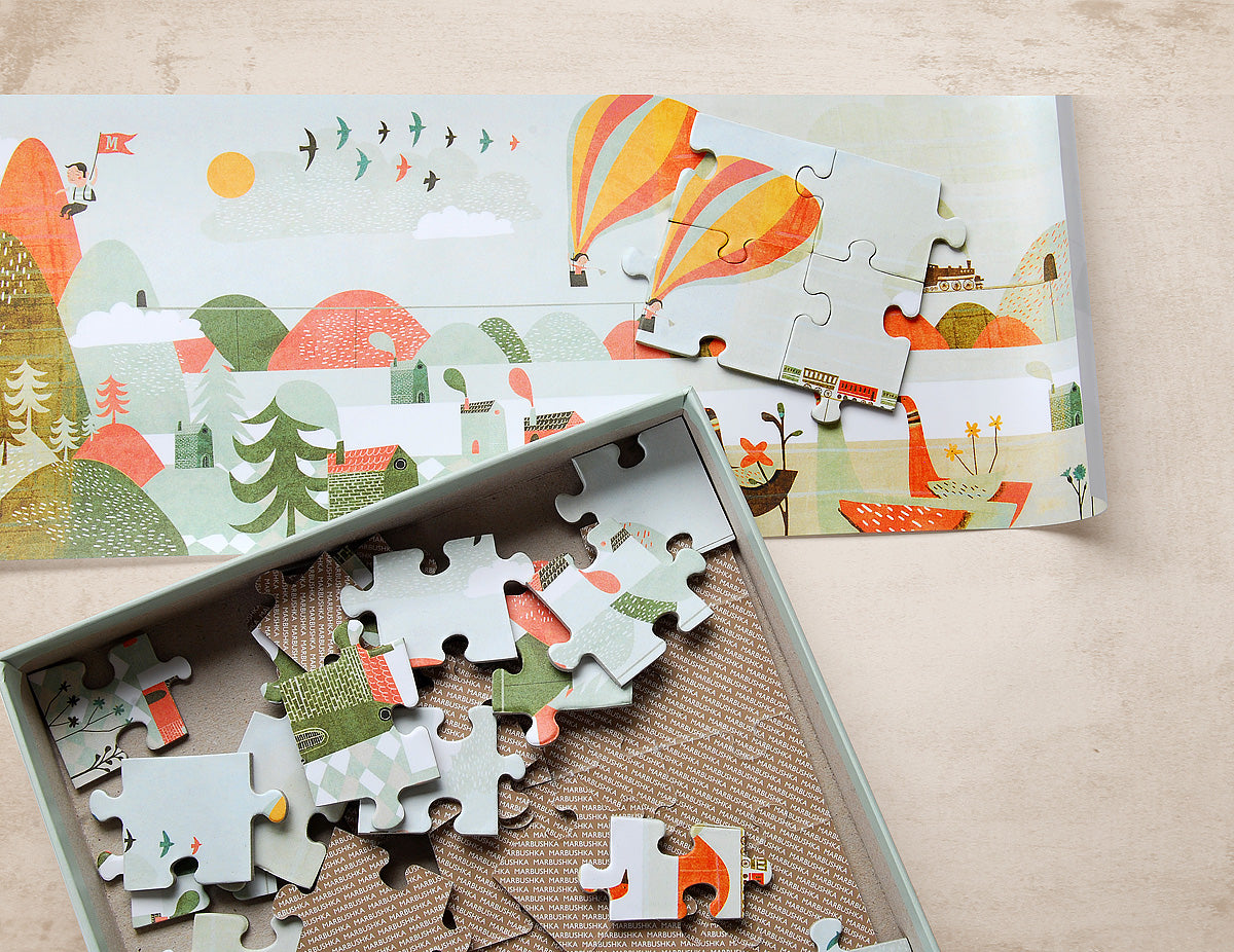Puzzle of nature with box and pieces