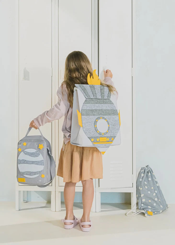 Cocovillage rocket adventure backpack on the shoulders of a girl