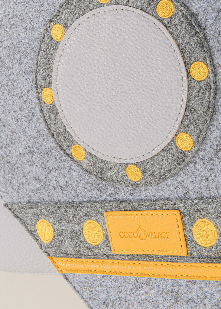 Close up of cocovillage label of rocket adventure children backpack