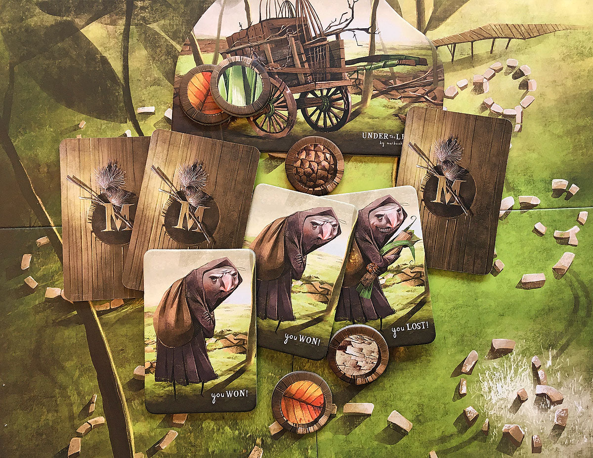Under the leaves board ame with game cards showing you won or you lost!
