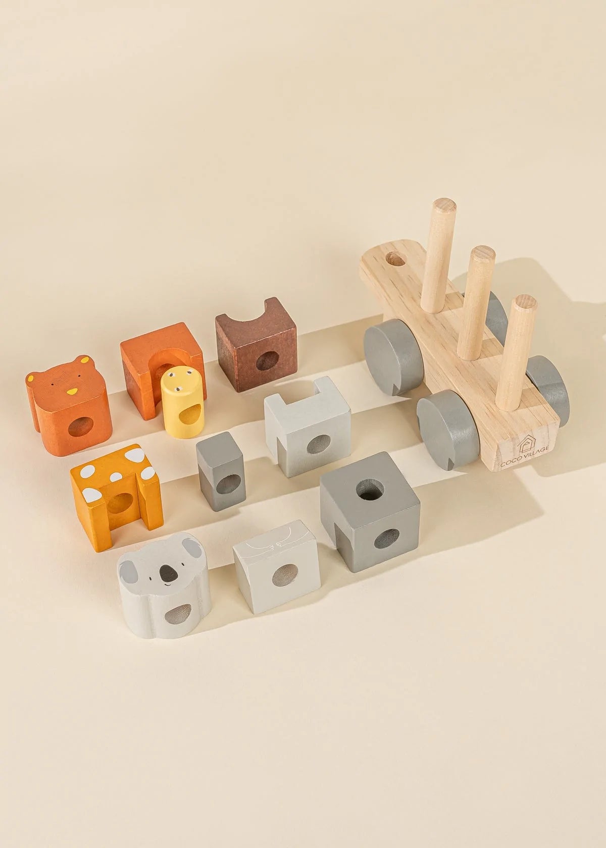 Dissembled pieces of Cocovillage wooden toy stacking train- circus series