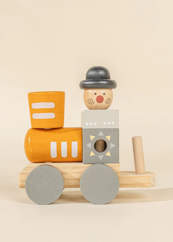 Clown on wooden toy stacking train