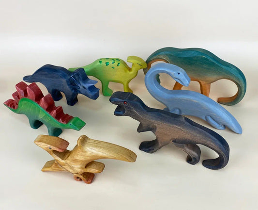 Hand-made jurassic world 7 pieces of wooden toy dinosaurs;  including Tyrannosaurus, Stegosaurus, Triceratops, Diplodocus, Plesiosaurus, Parasaurolophus and Pteranodon!