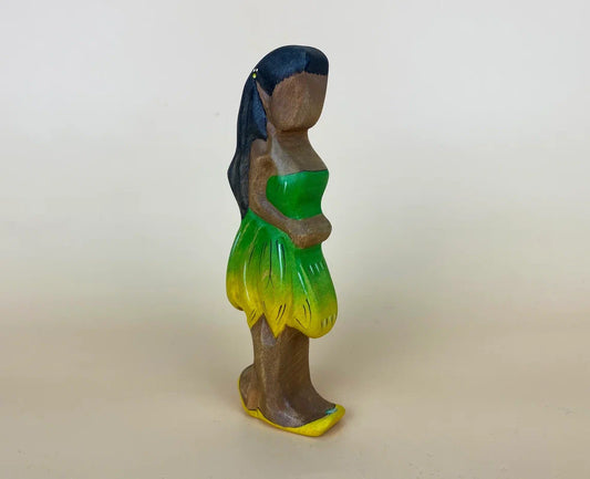 Hand-made wooden fairy figurine toy with dark skin, black hair and green dress for inclusiveness