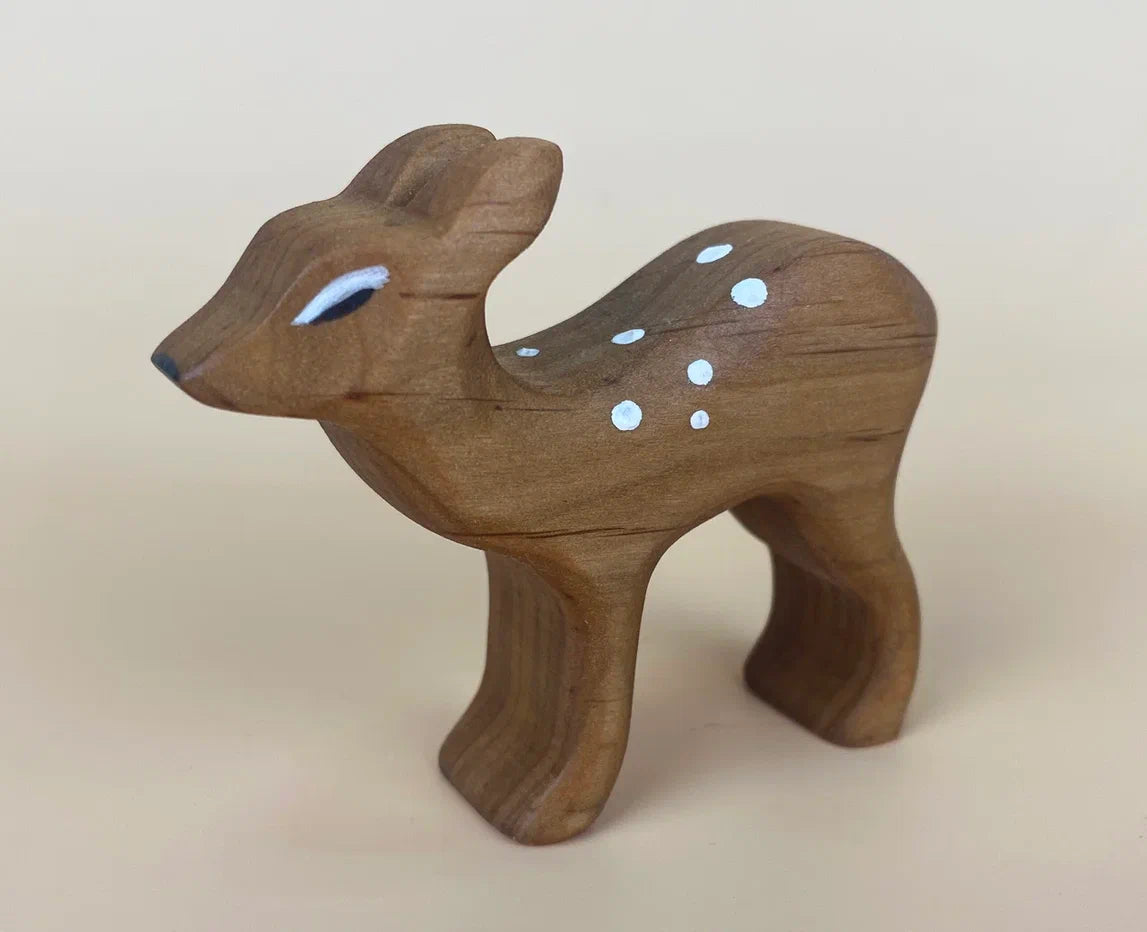 Brown wooden baby deer (fawn) toy with white spots