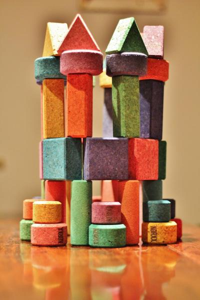 A tower made of cork building blocks of various shapes, from Korxx