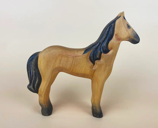 Brown wooden horse toy with long black mane and bushy black tail