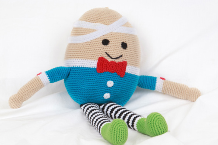 Humpty dumpty doll with blue shirt and red bow tie