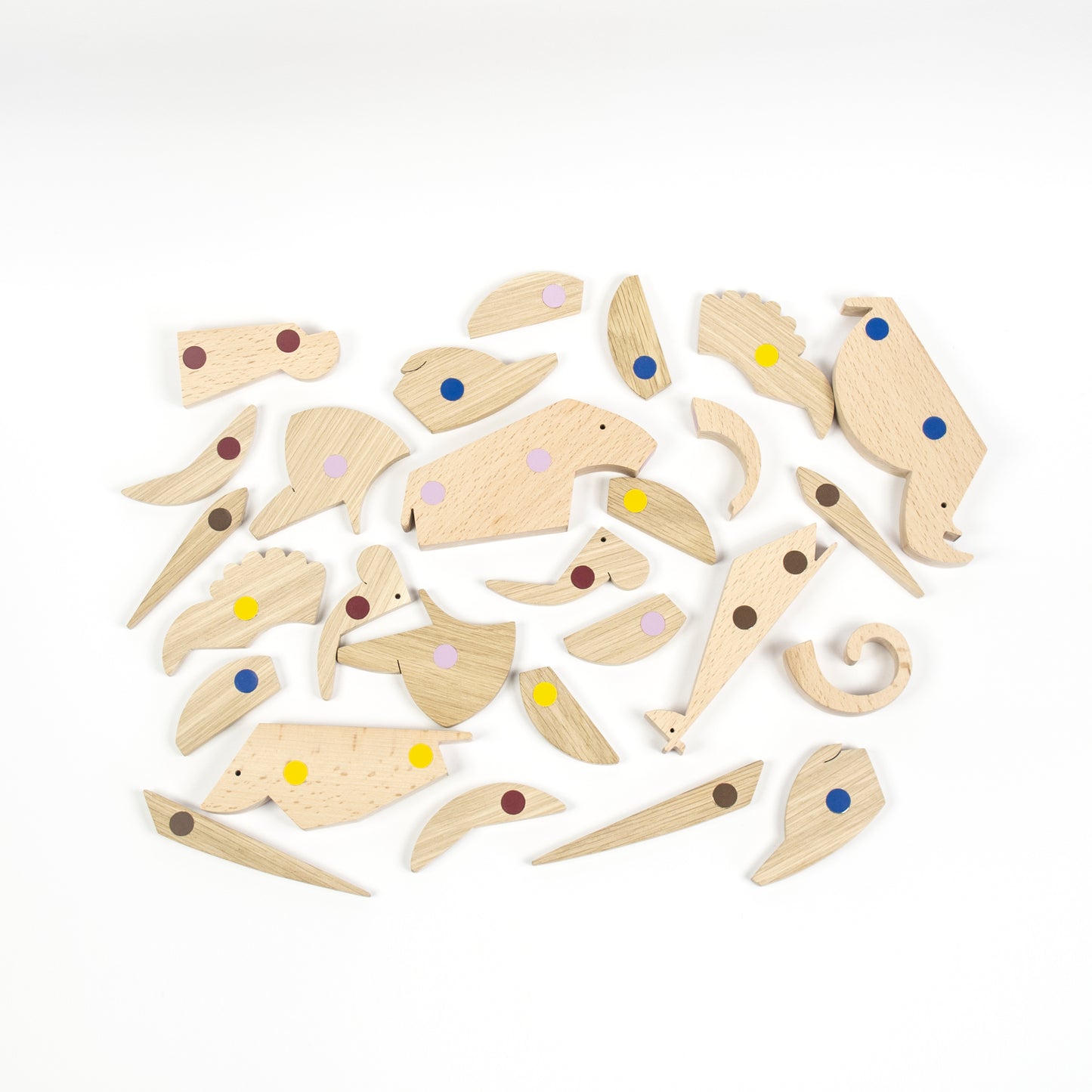 Magnetic wooden toy animals assembled from various shapes and forms- connect the coloured dots together!