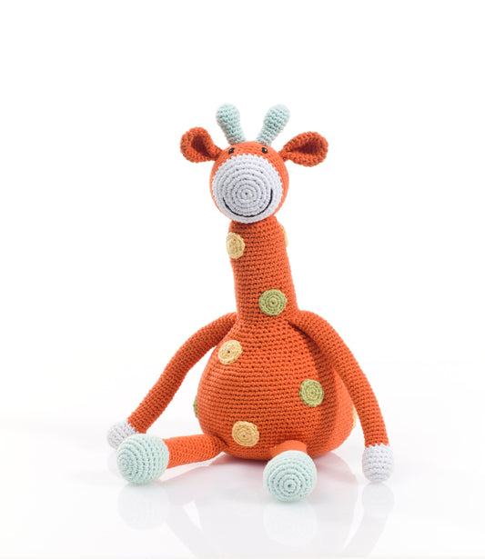 Orange giraffe soft toy with rattle, hand knitted from Pebblechild