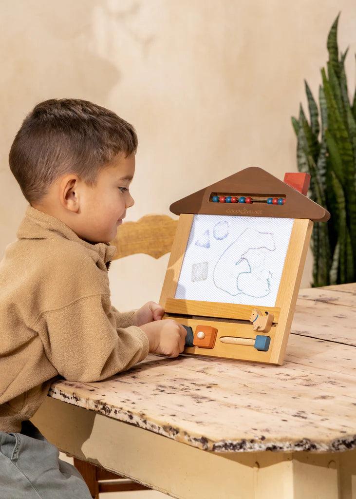 Child using oekaki magic drawing board from cocovillage with sleek exclusive design