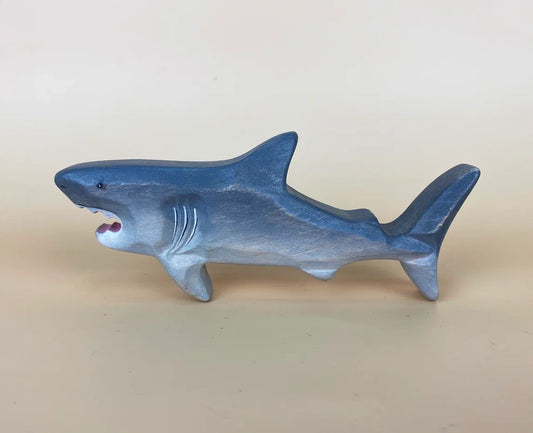 Grey blue wooden toy shark with sharp teeth