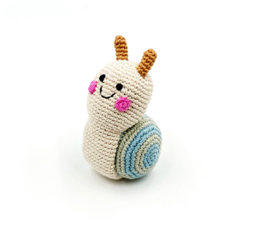 Cream-coloured smiling snail soft toy, hand knitted by Pebblechild