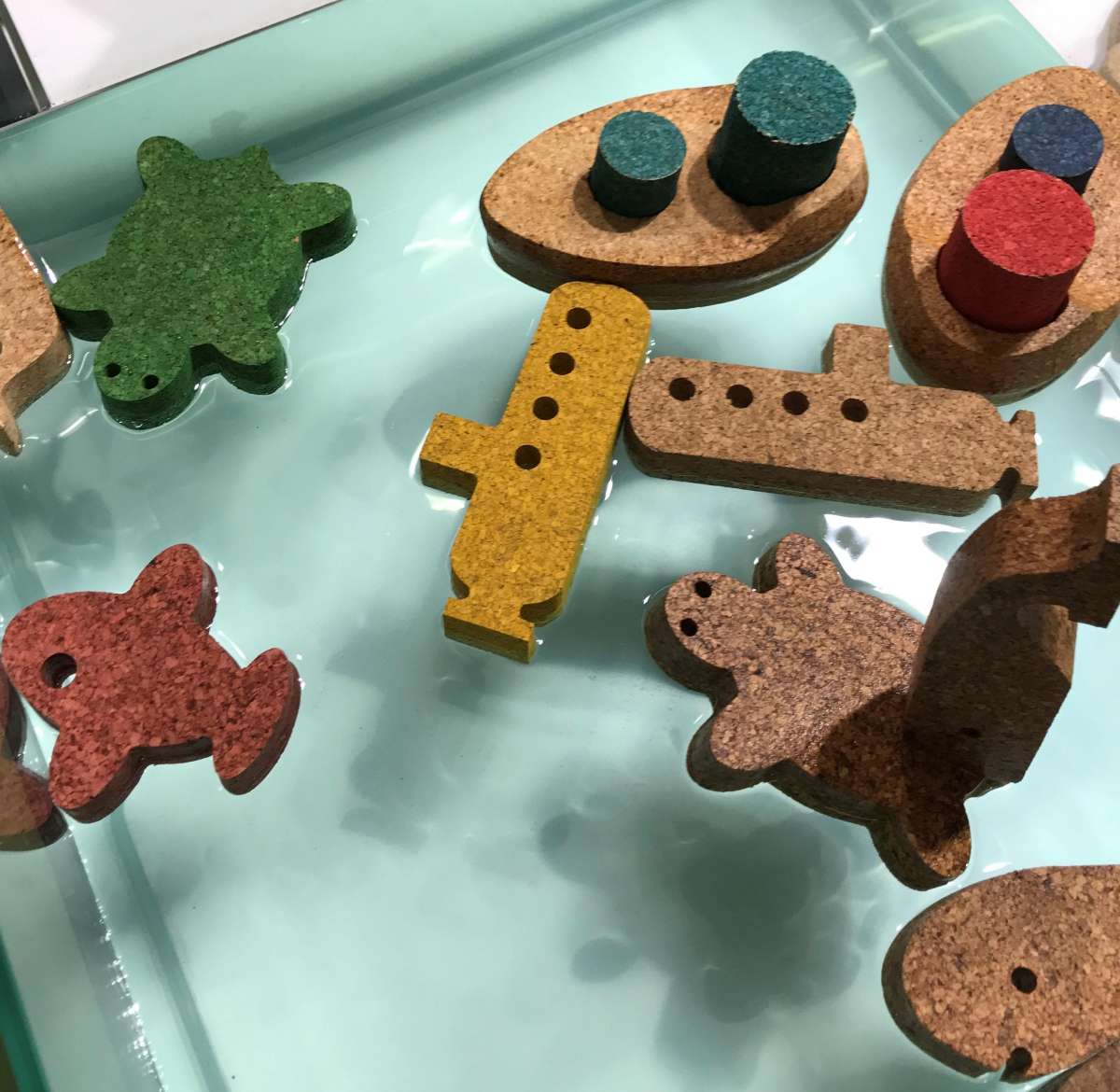 Assortment of cork bath toys that float on water