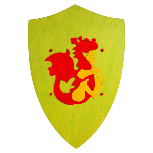 wooden toy shield in luminous green with red dragon