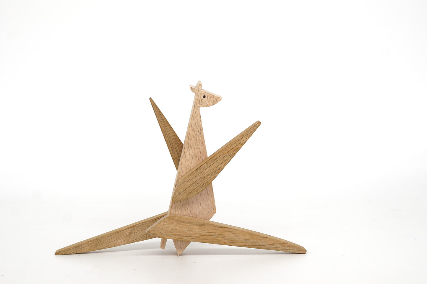 Who says Giraffes can't dance? Here's a magnetic wooden toy giraffe doing a split!
