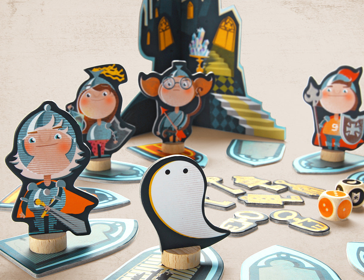 Close up of the ghost, heroes, dice and the golden keys in the board game
