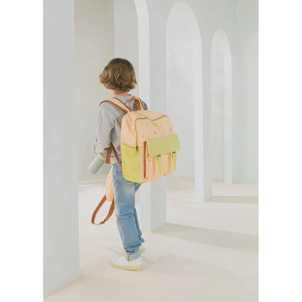Child wearing Girole backpack