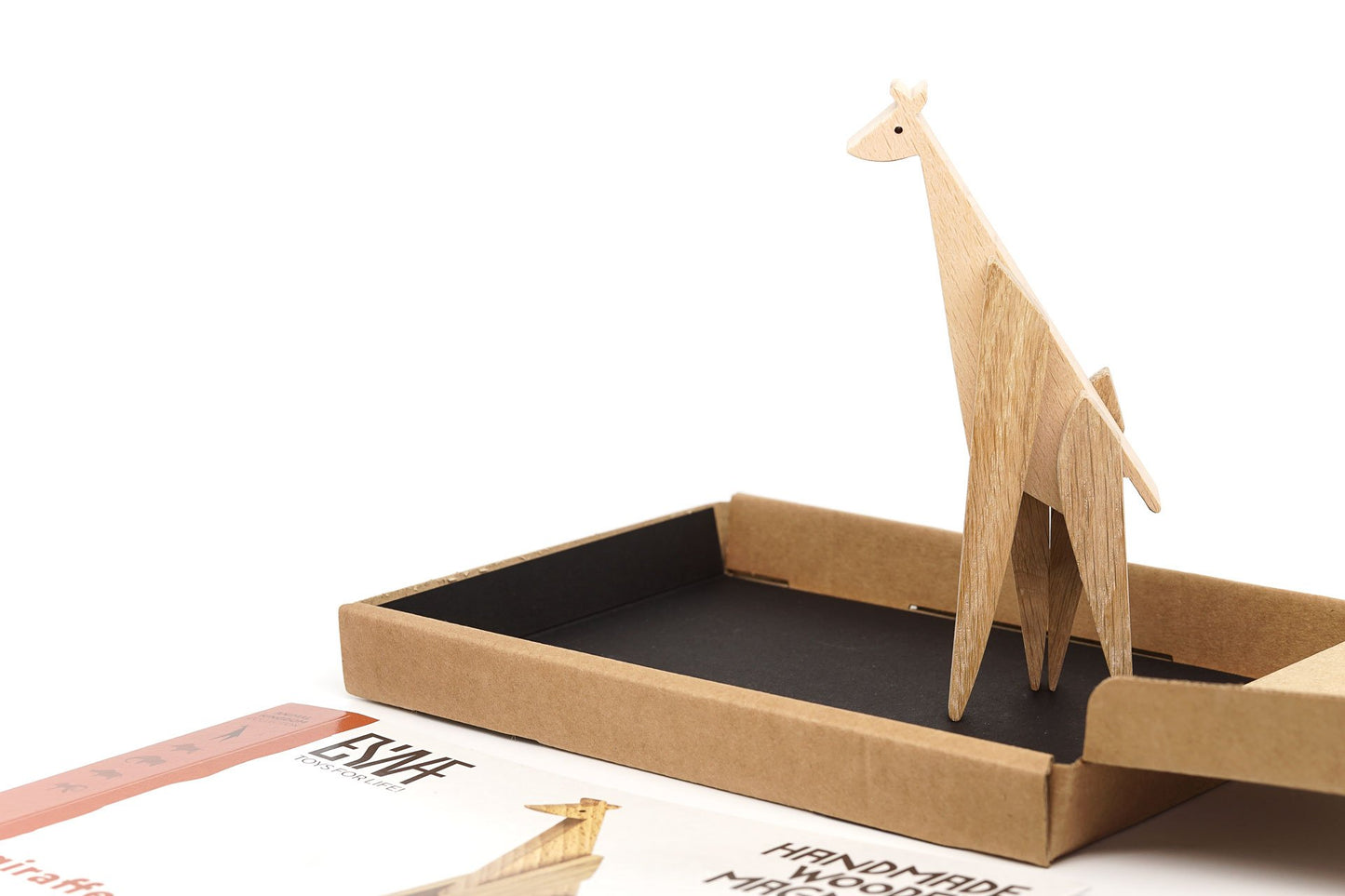 Magnetic wooden toy giraffe assembled from various shapes and forms