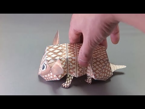 Video showing Kamikara's rollin armadillo origami toy curling into a ball when poked 