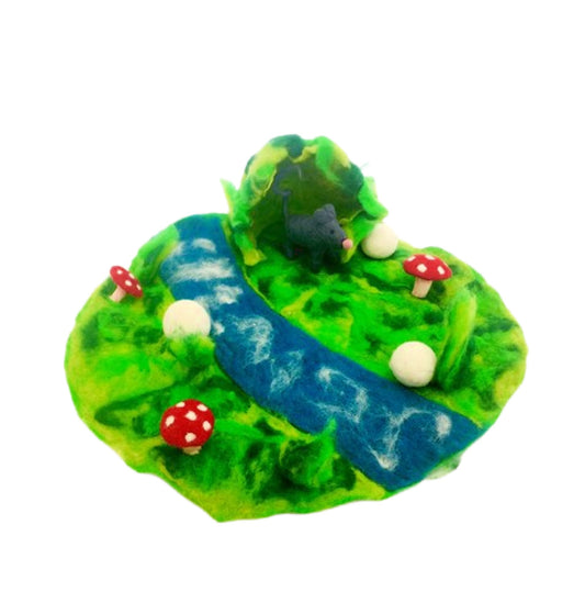 Fairy hollow felted play mat with lush green pastures and magic mushrooms and a flowing stream