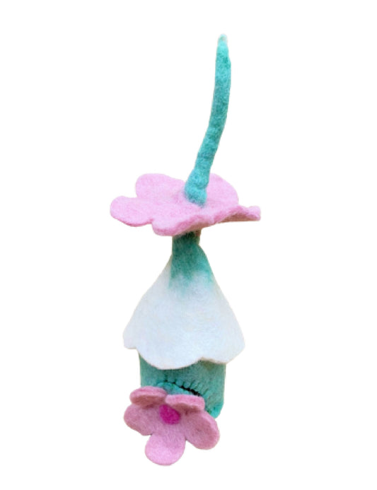 White and green felted toy- a fairy home with a pink flower door