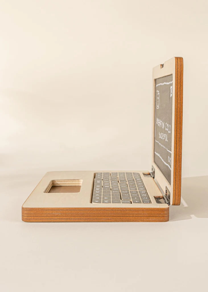 side view of wooden toy laptop from cocovillage