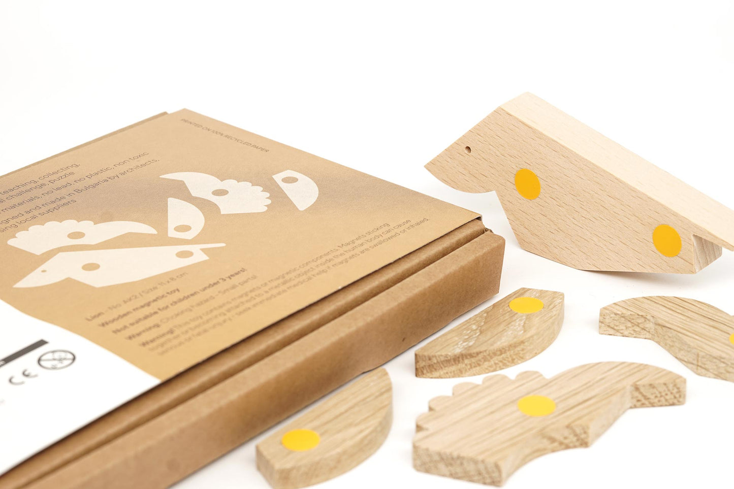 Assemble a magentic wooden toy lion using various parts by connecting the dots.
