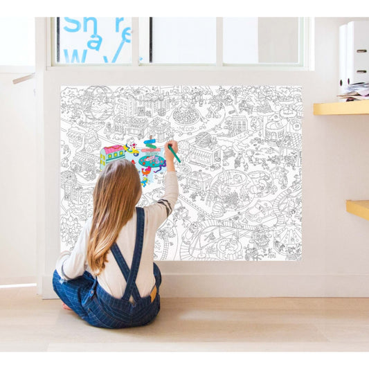 Girl colouring Omy's giant colouring poster featuring animal city