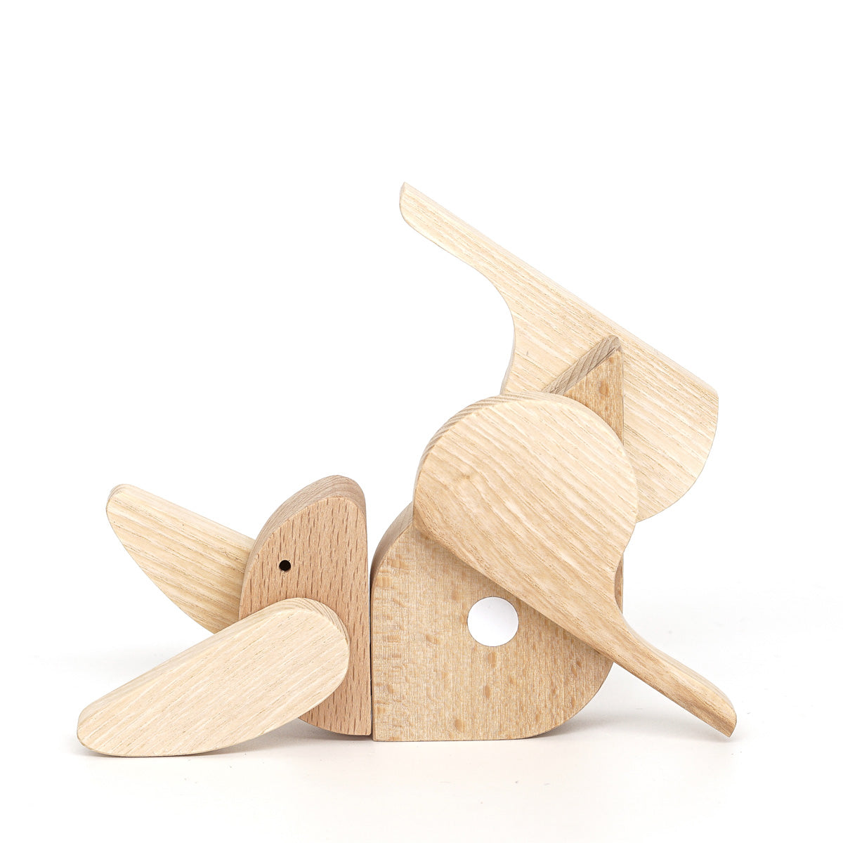magnetic wooden toy rabbit lying on its back