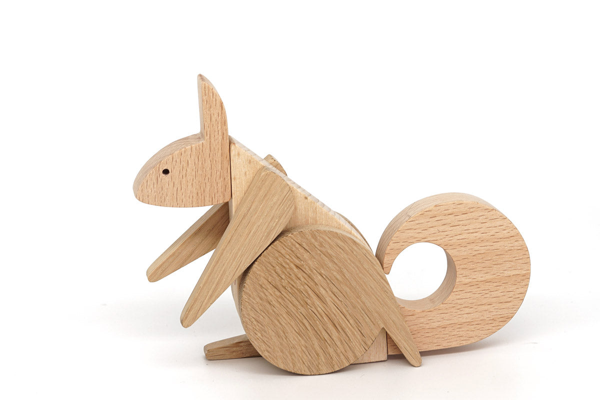 Magnetic wooden toy squirrel standing on hindlegs